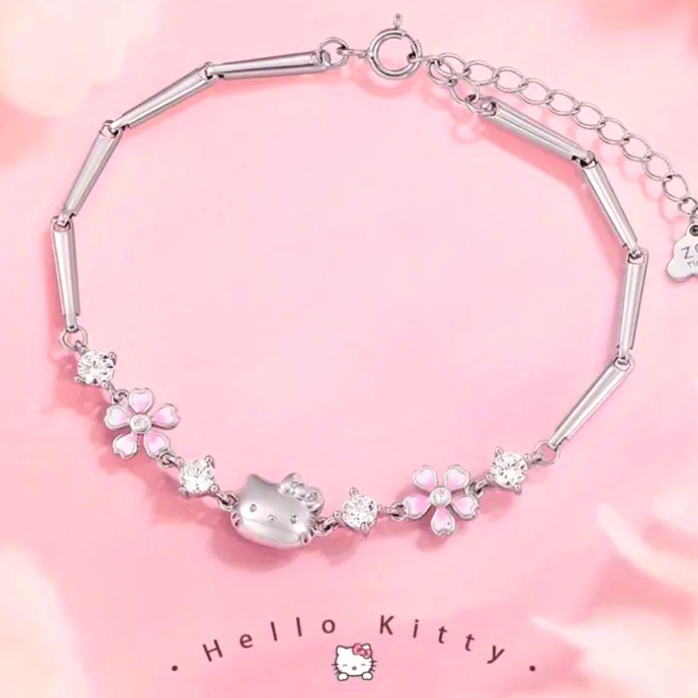 NWOT Sanrio Hello Kitty Bracelet with Sakura Charm Accent   New